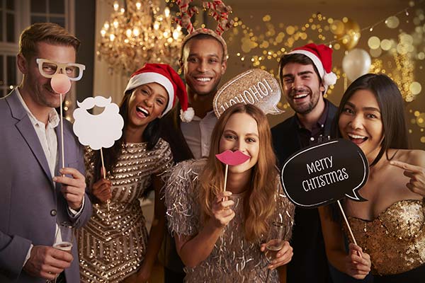 Guests posing for a photo at a Bay Area event