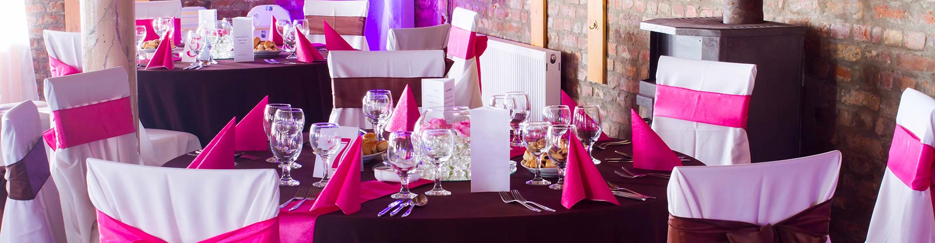 Table set with glasses and napkins at event in Vallejo